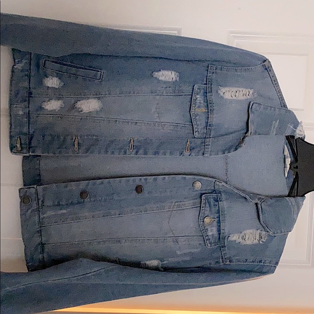 Distressed denim jacket
